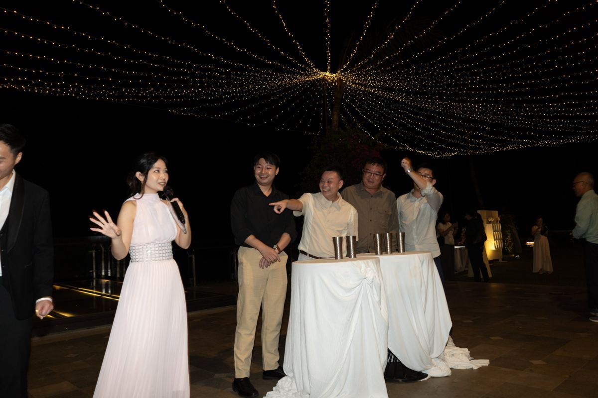 Hosting under fairy lights at an evening celebration