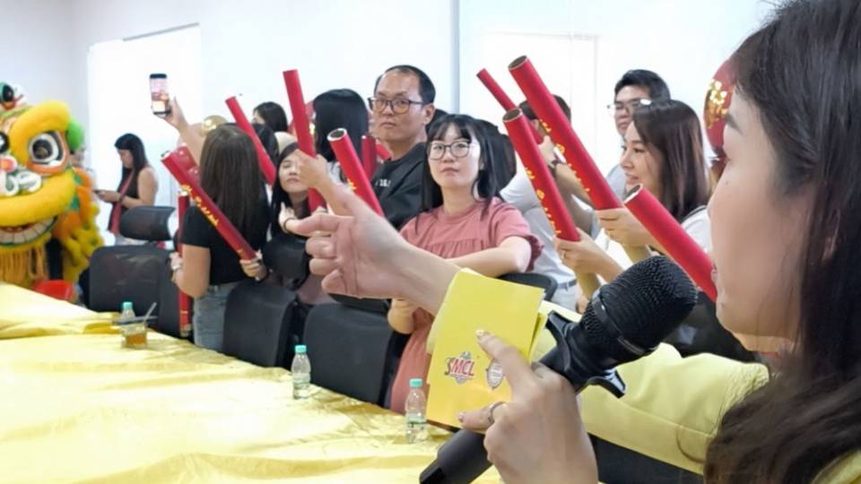 Leading a lion dance firecracker moment at the SMCL Office Grand Opening