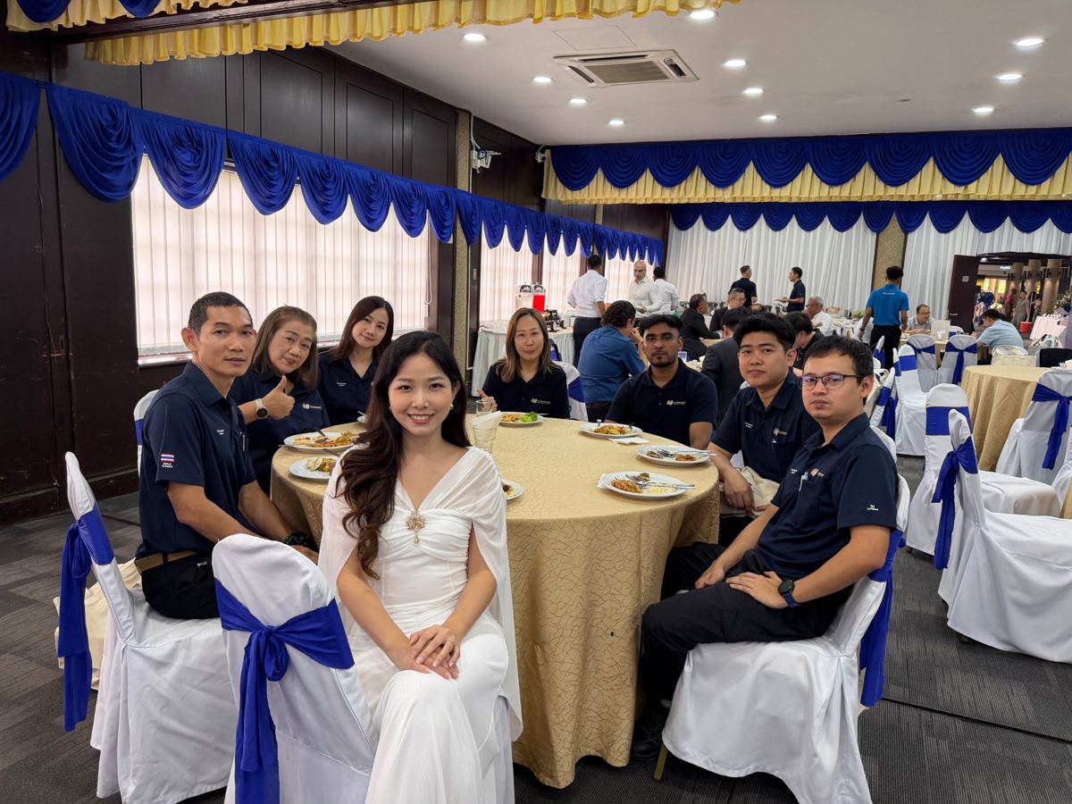 Seated with executives at the Aotecar Group Plant Opening